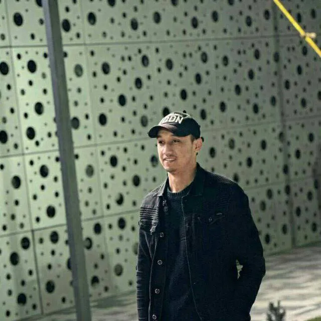 Аслбек Хамроев